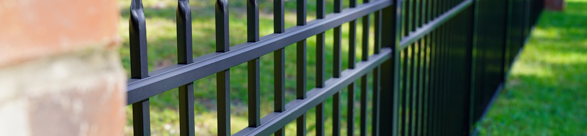 Black ornamental fence installed by Floyd Fence