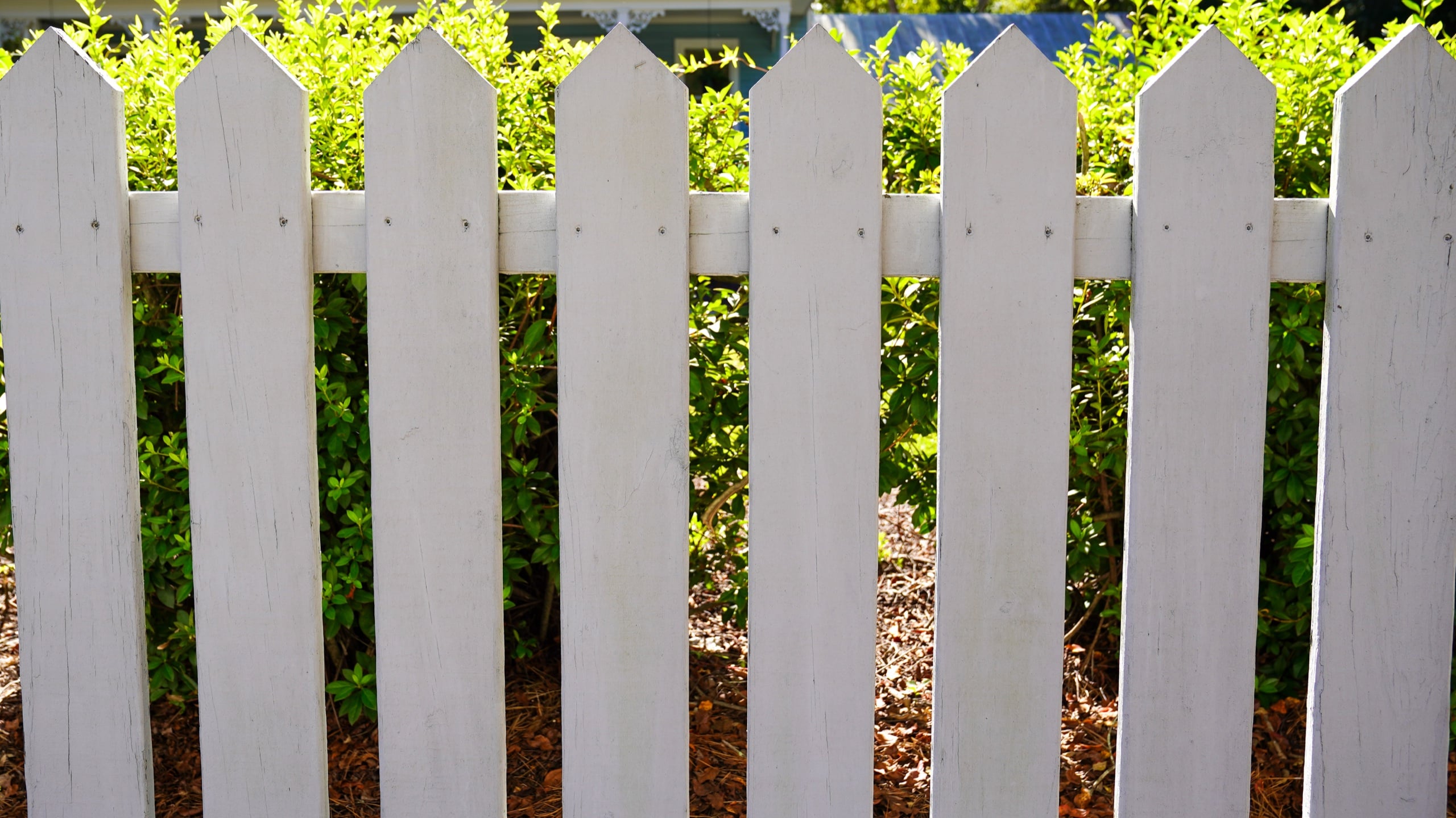 White picket fence installed by Floyd Fence